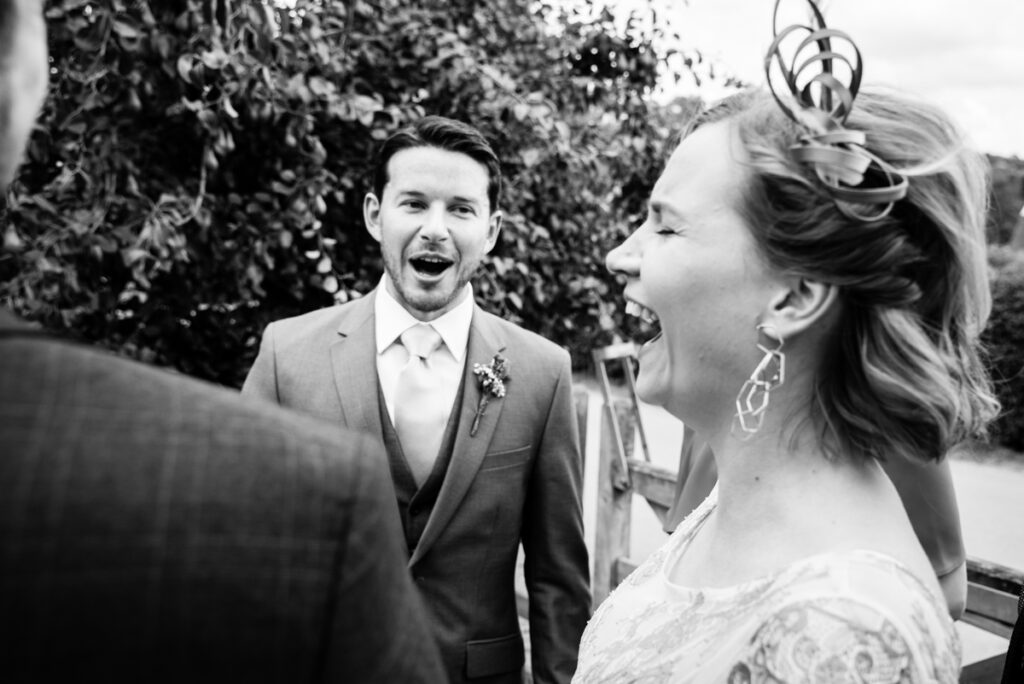 Groom and guests laughing Wedding Photographer Ottawa