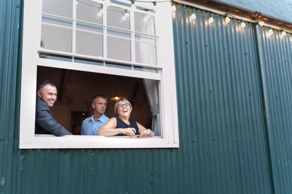 Guests at Reception from Window Wedding Photographer Ottawa