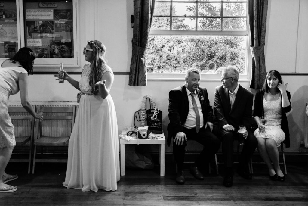 Wedding Photographer Ottawa Documentary Black and White Photo of Guests at reception
