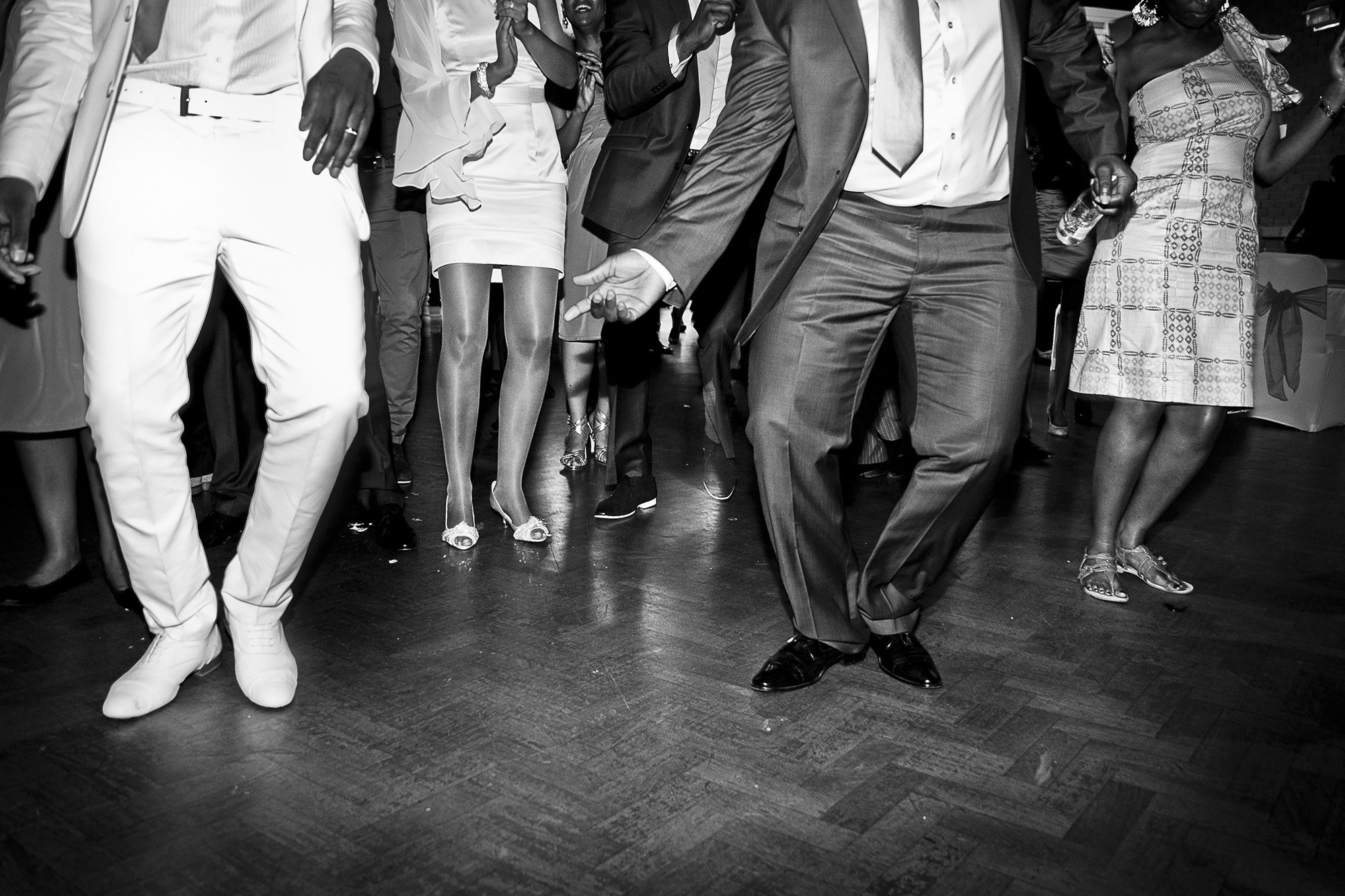 Ottawa African wedding photographer Maciver_17SEP2011_678 ❥ Ottawa Wedding Photographer Black and white reportage wedding photograph of wedding guests dancing