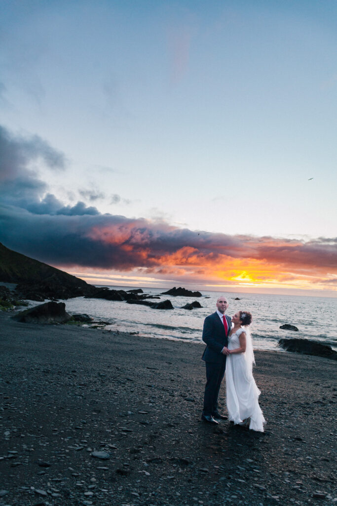 Couple Portrait on beach with sunset Wedding Photographer Ottawa