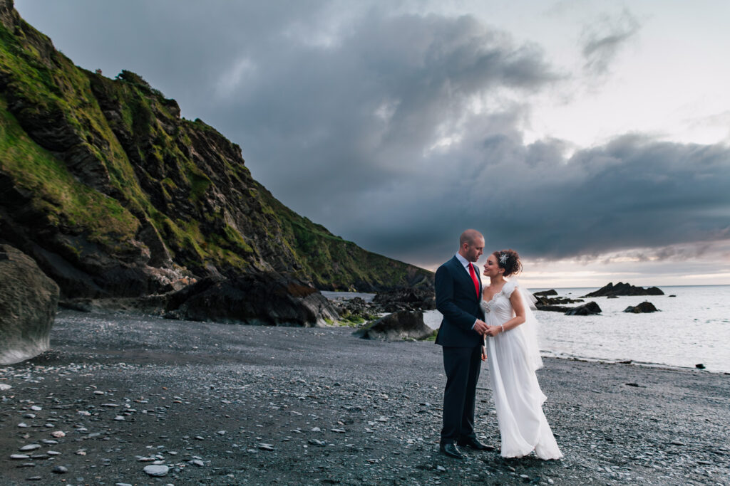 Couple Portrait against cliffs in background Wedding Photographer Ottawa