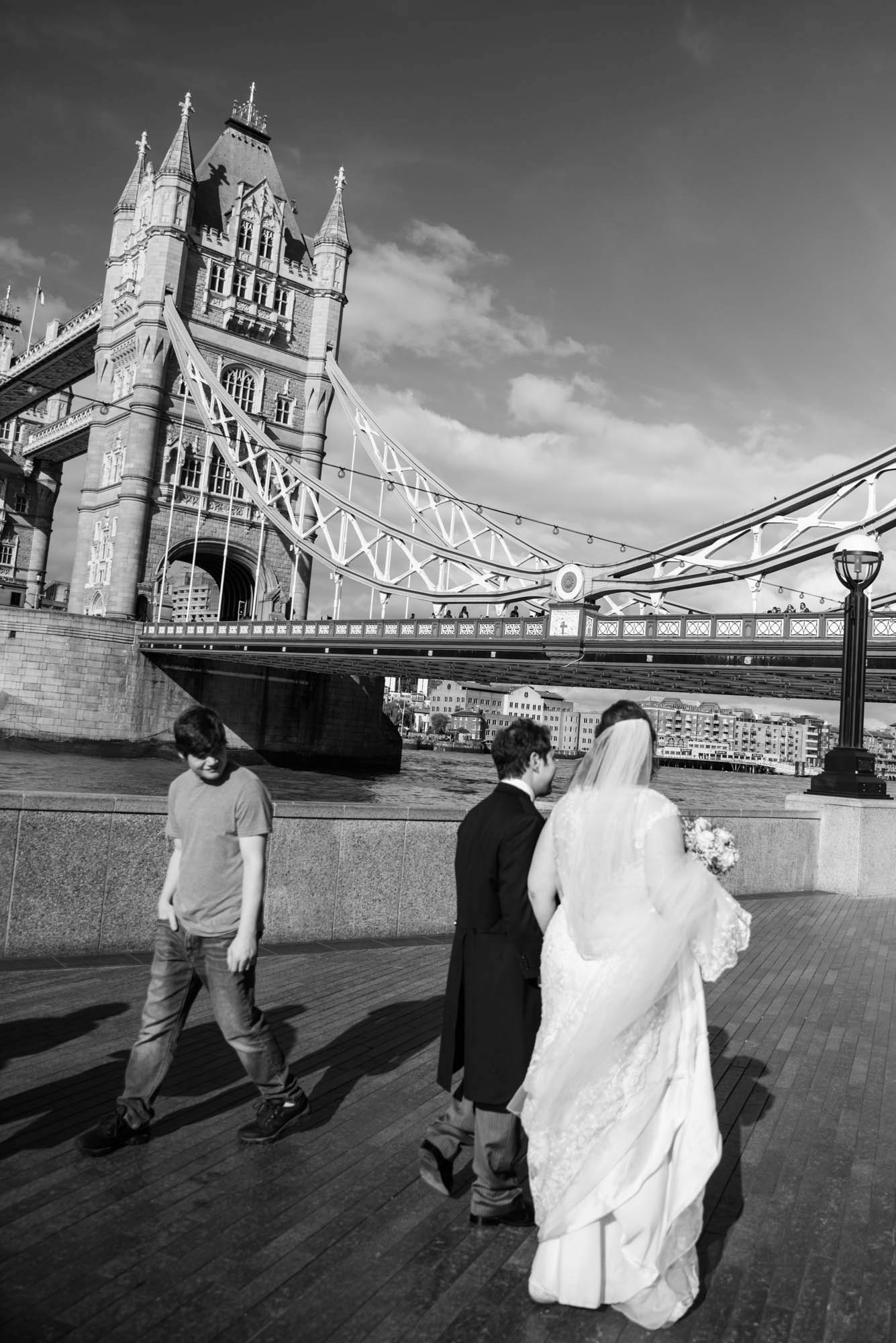 Documentary wedding photographer-StephRose-483 ❥ Ottawa Wedding Photographer documentary wedding photographer sara - couple walking past tower bridge