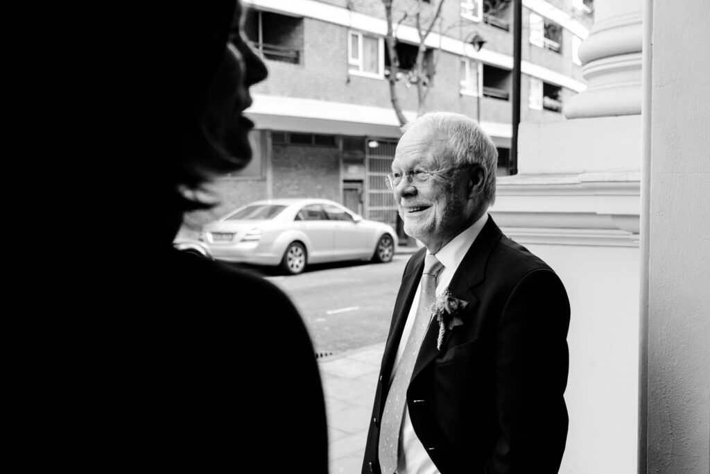 Father of the bride outside venue by Sara wedding photographer ottawa