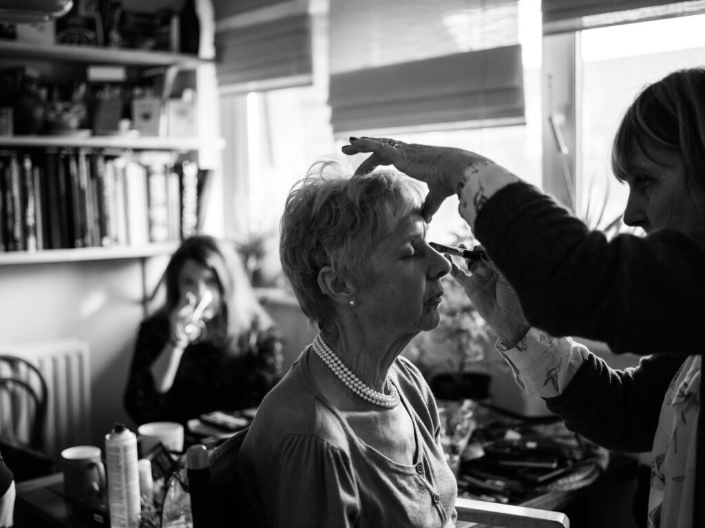 Mother of the bride having her make-up done by ottawa wedding photographer - documentary reportage