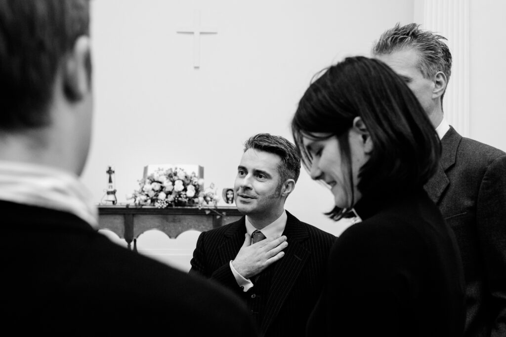 Groom preparing before the ceremony by Ottawa Wedding Photographer Sara