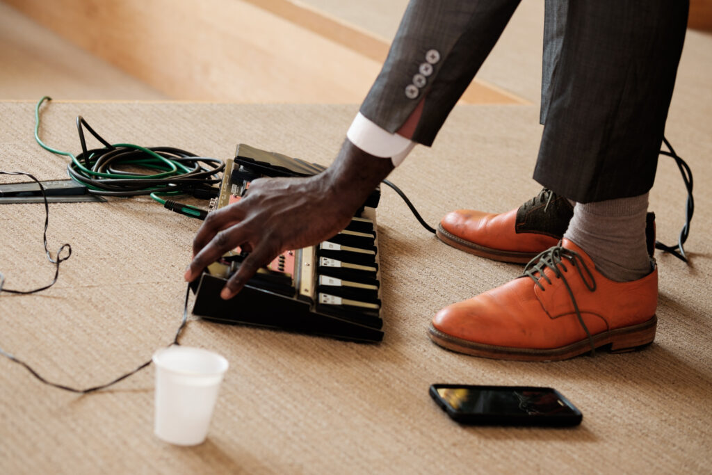 Detail of Musician and instrument during ceremony by Ottawa Wedding Photographer Sara