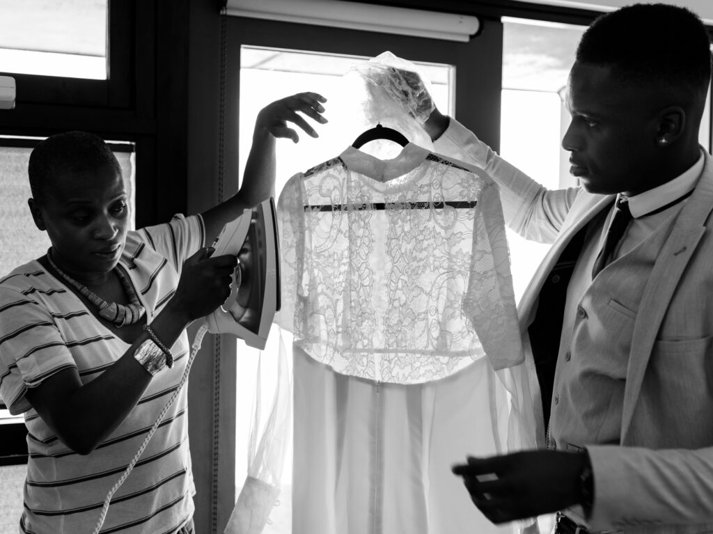 Steaming a lace vintage wedding dress - Ottawa Wedding Photographer Sara