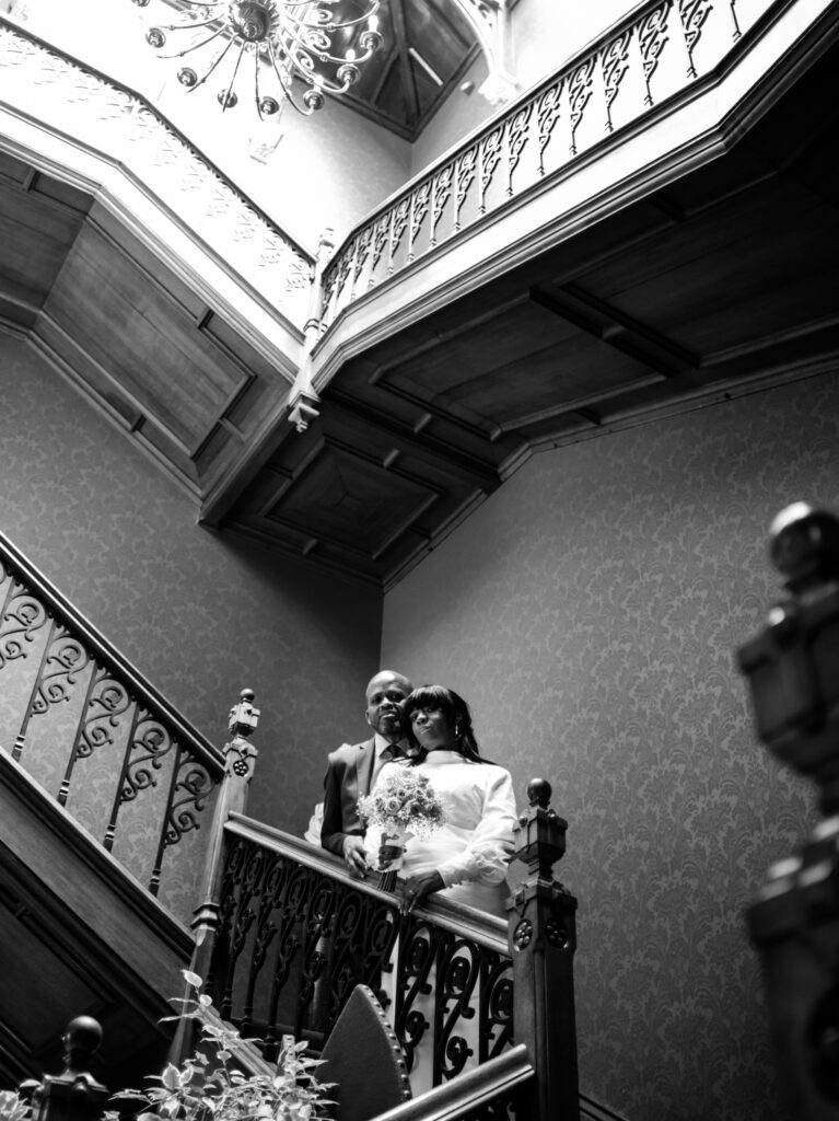 Portrait of Bride and Groom on Staircase by Ottawa Wedding Photographer Sara