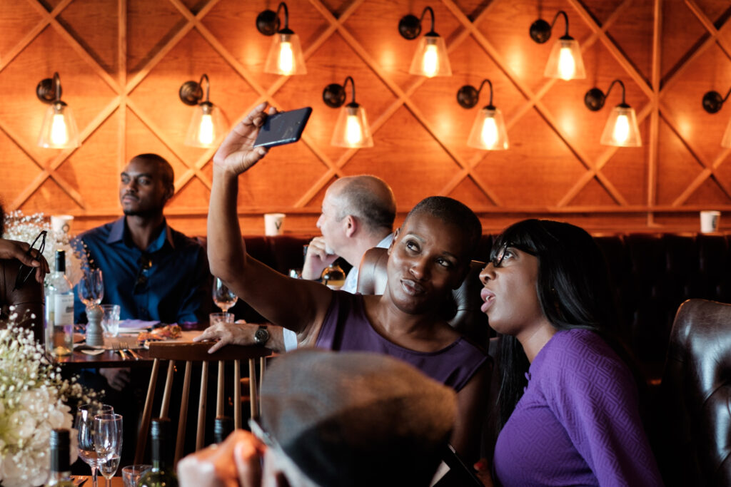 Guests taking selfies at reception by Ottawa Wedding Photographer Sara