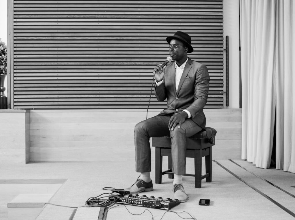 Musician singing during ceremony by Ottawa Wedding Photographer Sara