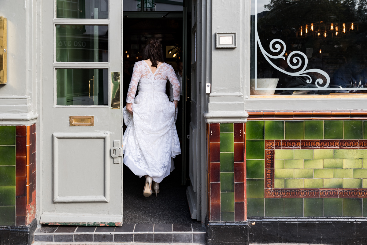Ottawa wedding photographer Sara LD-067jpg ❥ Ottawa Wedding Photographer Bride walking into venue by Ottawa Wedding Photographer Sara