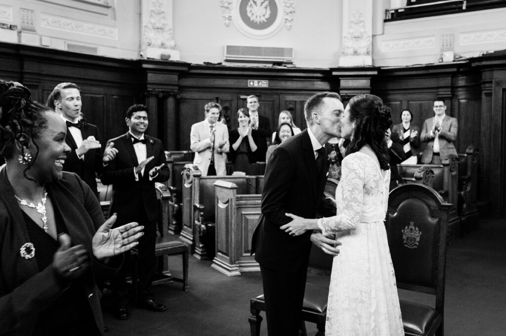 Bride and Groom kiss after ceremony by Best Ottawa wedding photographer Sara
