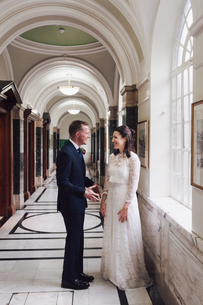 Portrait of the Bride and Groom after the ceremony by Ottawa Wedding Photographer Sara