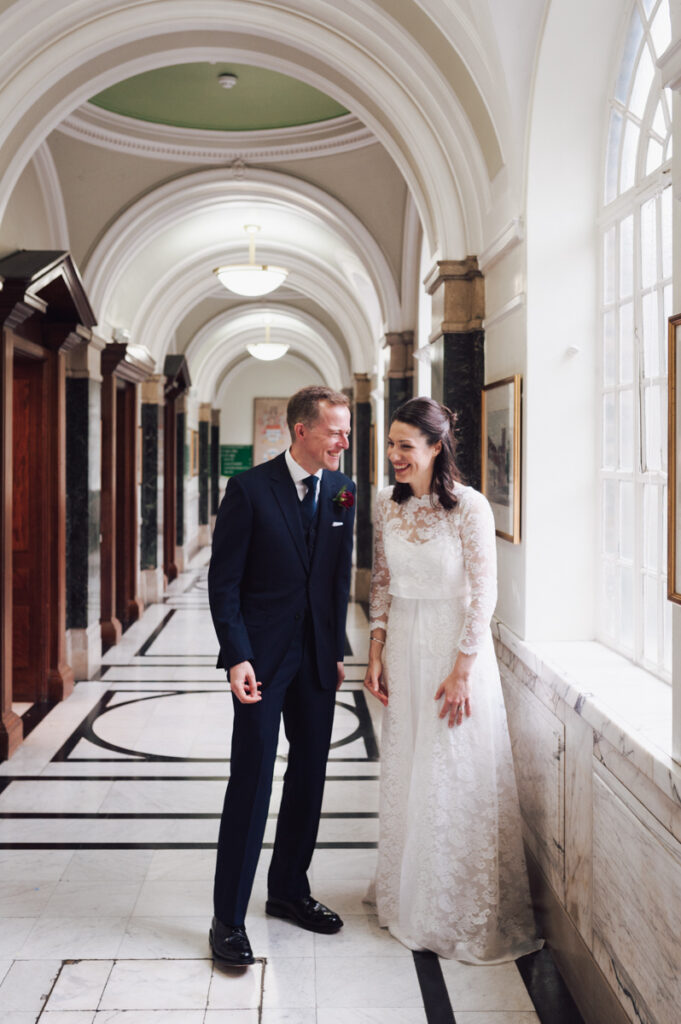 Portrait of the Bride and Groom after the ceremony by Ottawa Wedding Photographer Sara