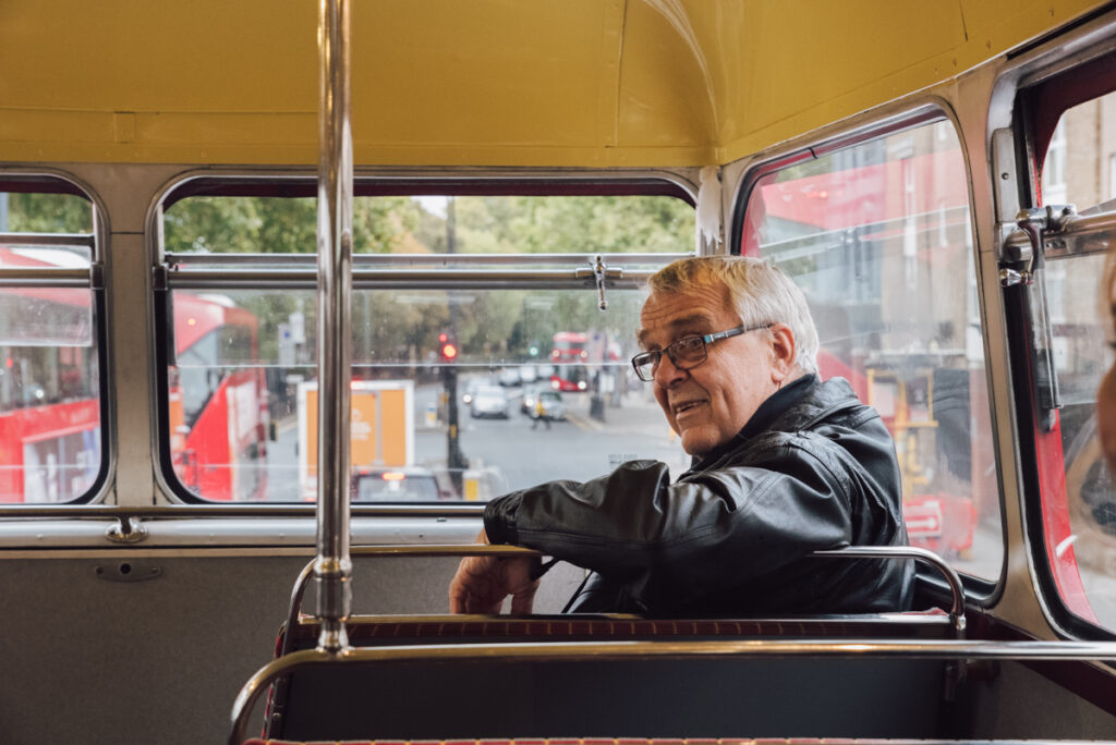 Guests traveling in a bus to the reception venue by Ottawa Wedding Photographer Sara