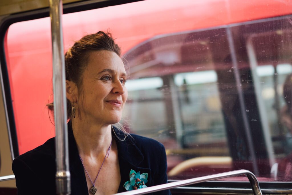Guests traveling in a bus to the reception venue by Ottawa Wedding Photographer Sara