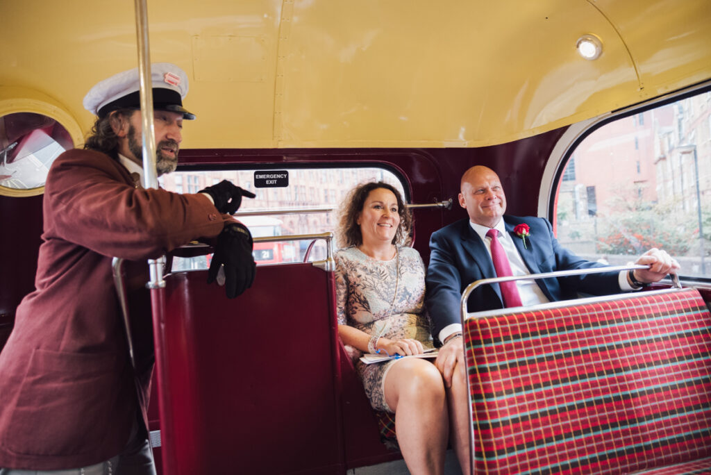Guests traveling in a bus to the reception venue by Ottawa Wedding Photographer Sara