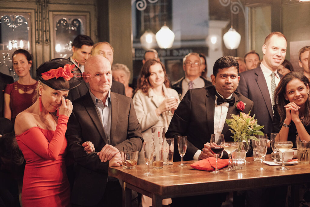 Wedding guests during speeches. Documented by Ottawa Wedding Photographer Sara