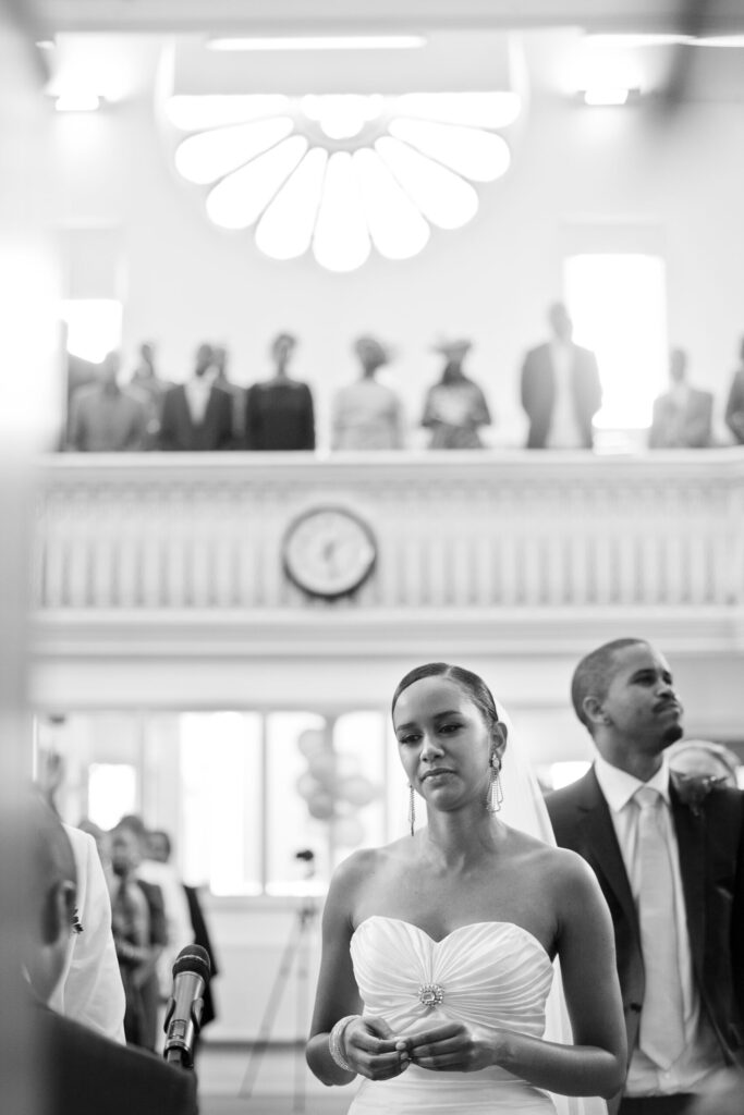 Black and white photograph in a church of the Bride at the altar