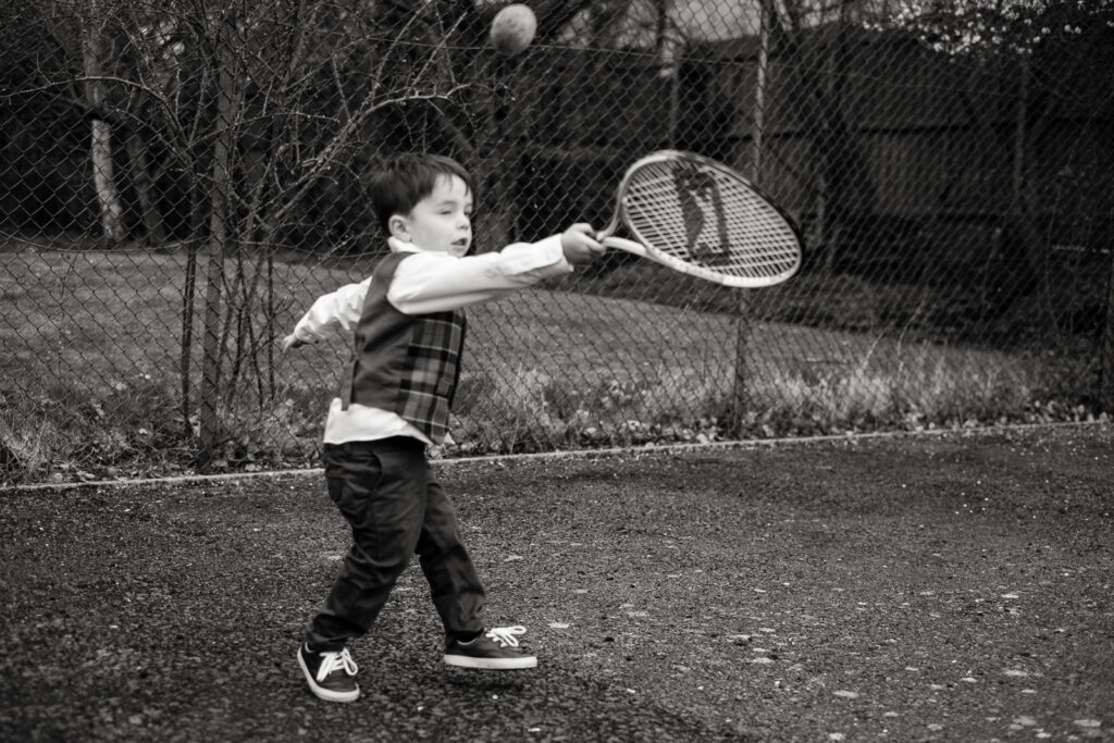 Ottawa Wedding Photographer Sara | Boy playing tennis at reception
