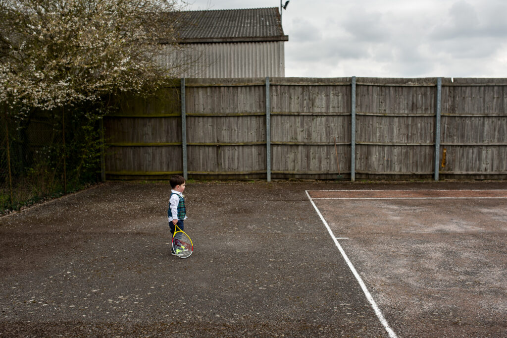 Ottawa Wedding Photographer Sara | Boy playing tennis at reception