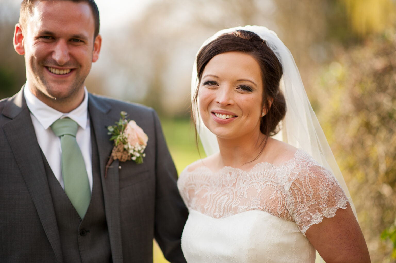 Couple portrait of Bridge and Groom in Gardens by Ottawa Wedding Photographer Sara