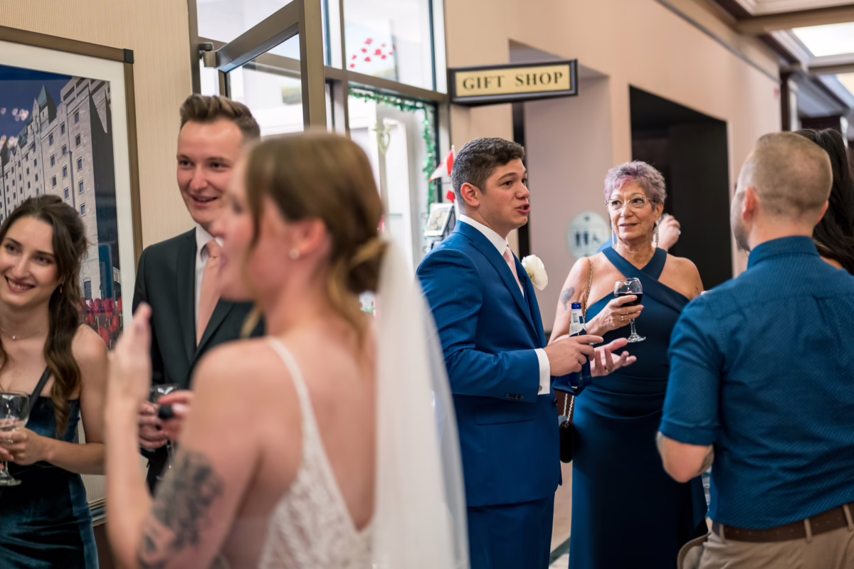 Ottawa Wedding Photographer Sara VD-1132974 ❥ Ottawa Wedding Photographer Guests mingling at cocktail hour in the lord elgin hotel by Ottawa Wedding Photographer Sara