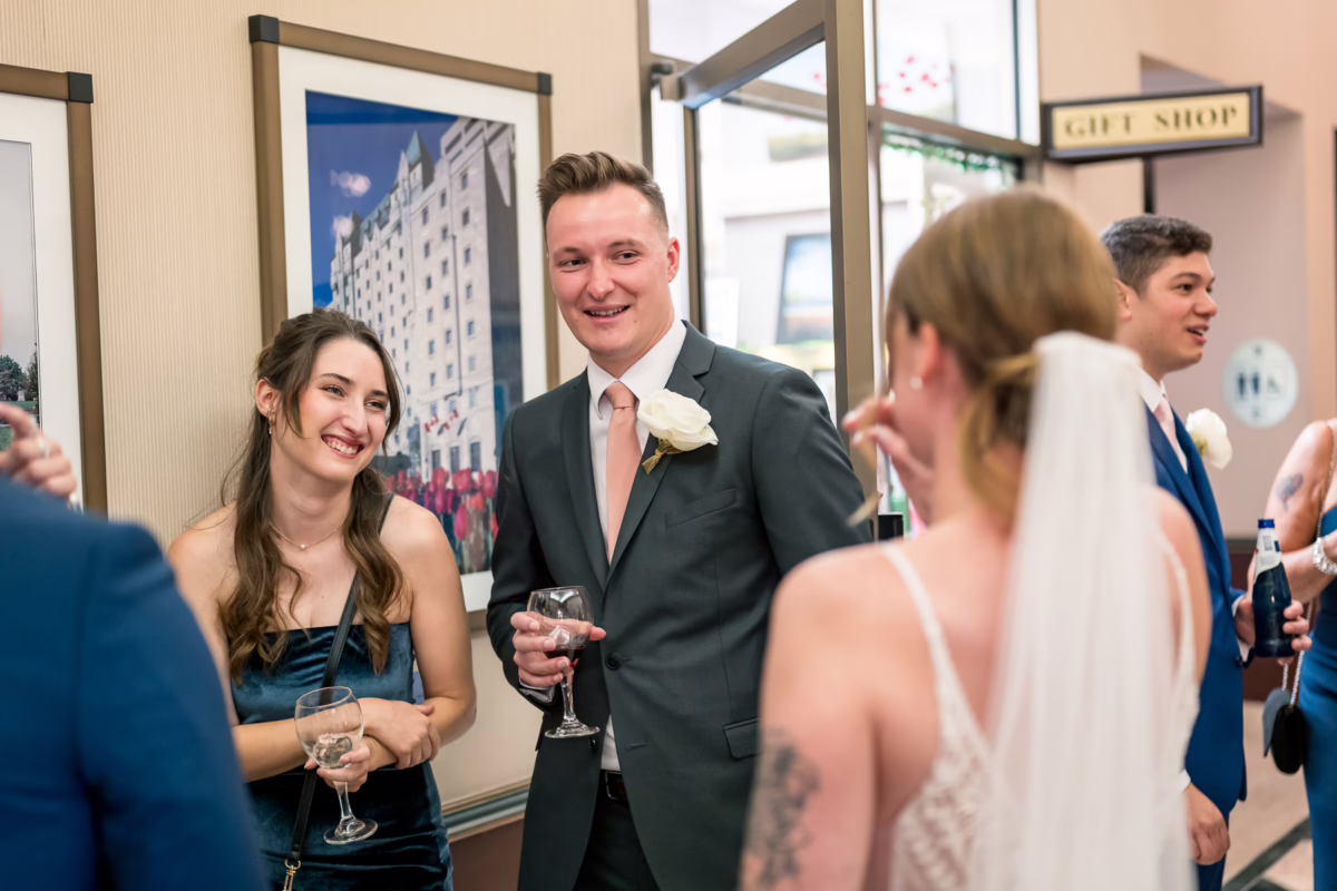 Ottawa Wedding Photographer Sara VD-1132989-2 ❥ Ottawa Wedding Photographer Candids of the Family with the bride during cocktail hour by Ottawa Wedding Photographer Sara