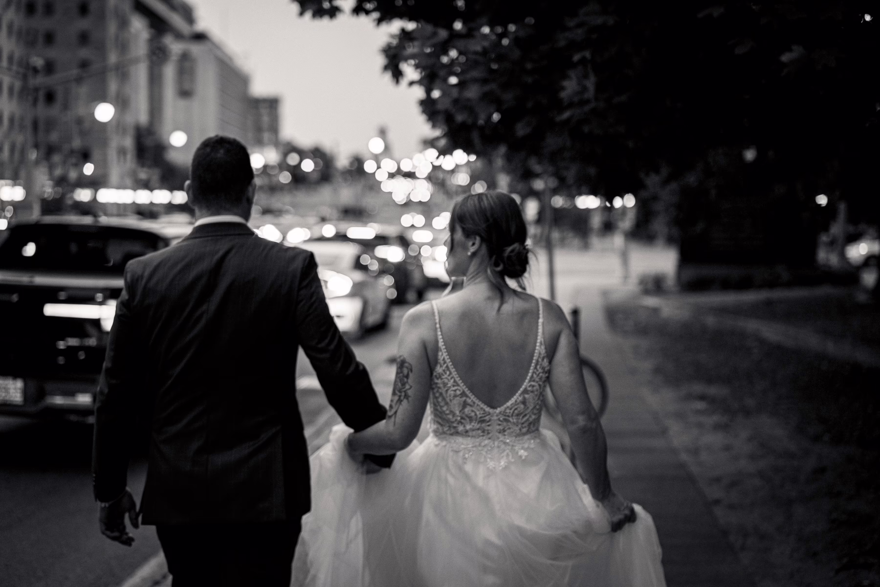 Ottawa Wedding Photographer Sara VD-1143461 ❥ Ottawa Wedding Photographer Bride and groom walk down Elgin street in downtown Ottawa by Ottawa Wedding Photographer Sara
