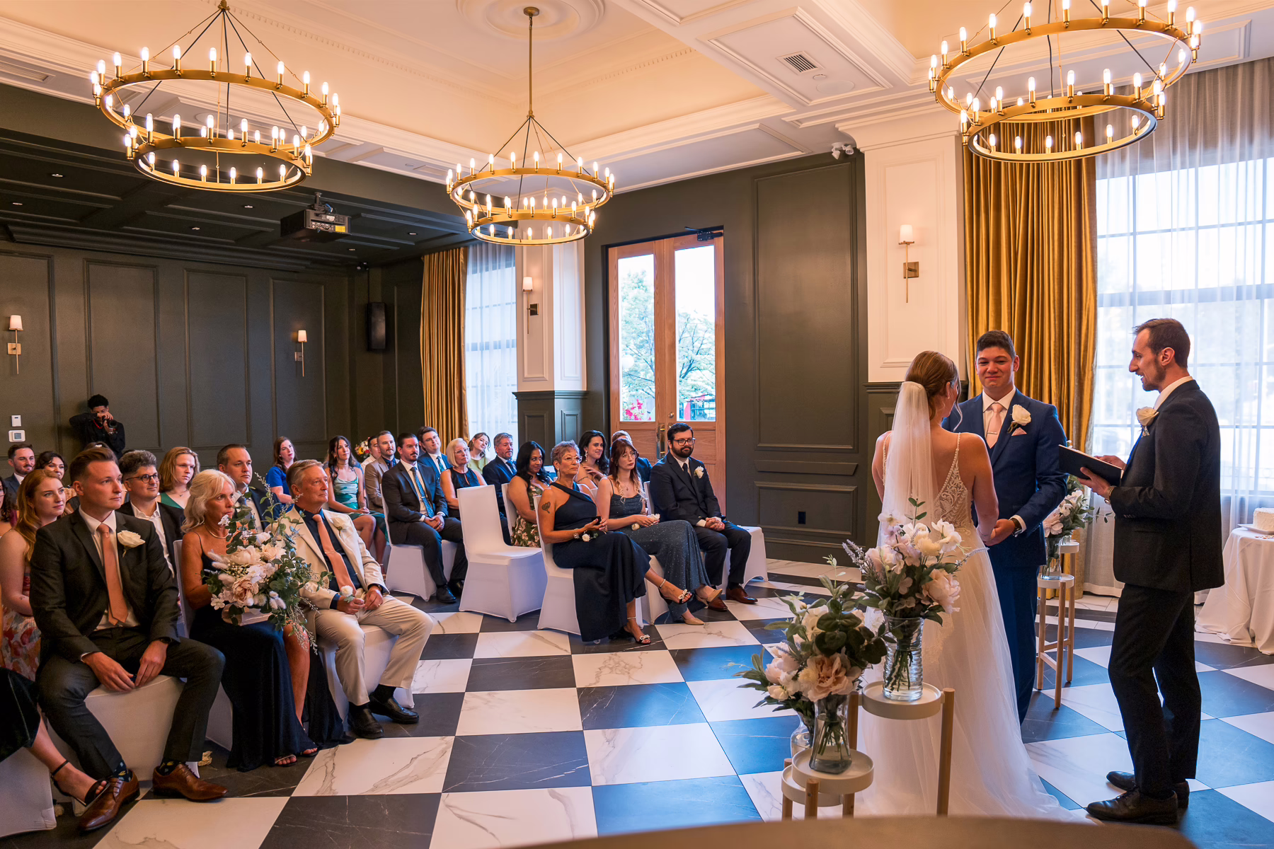 Ottawa Wedding Photographer Sara VD-4707 ❥ Ottawa Wedding Photographer Wide shot of trillium room at the lord elgin hotel during the ceremony by Ottawa Wedding Photographer Sara